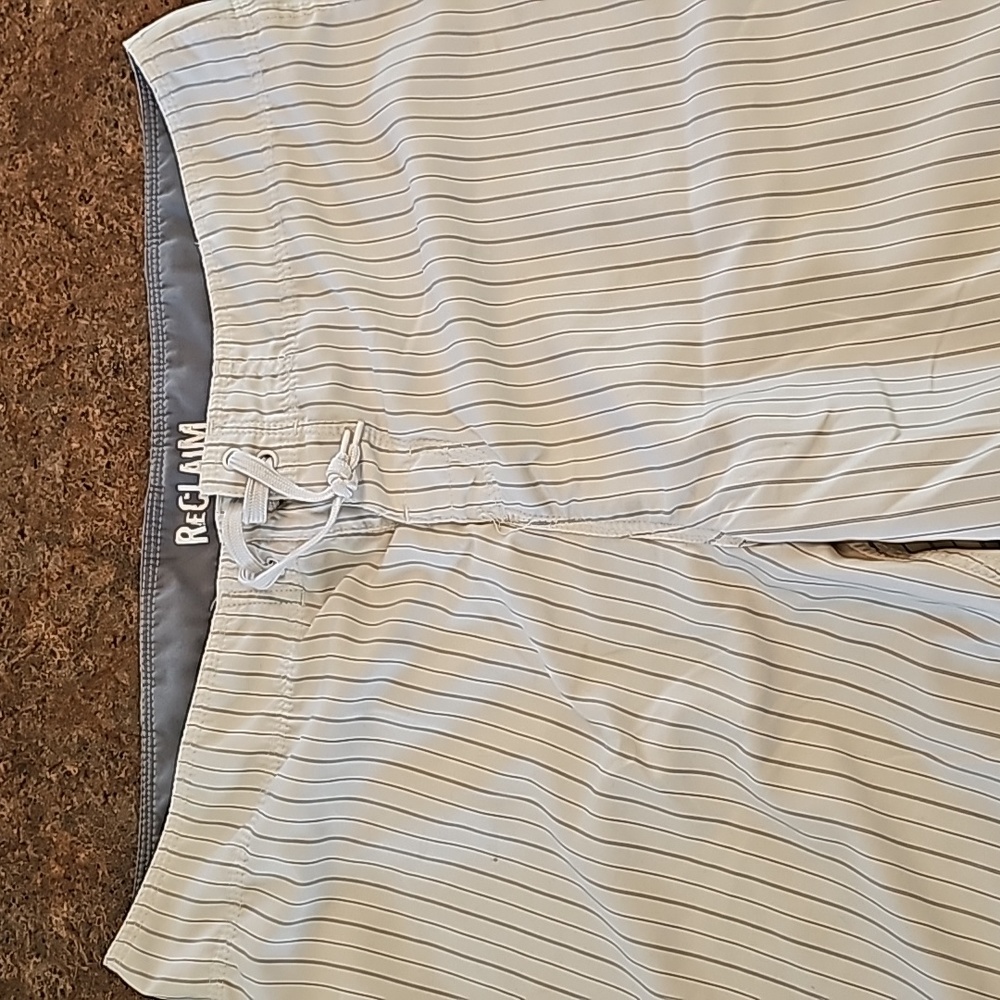 Reclaim brand from Buckle size 38 board shorts